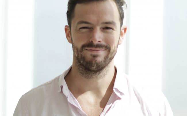 Headshot photo of one of the meetings presenters