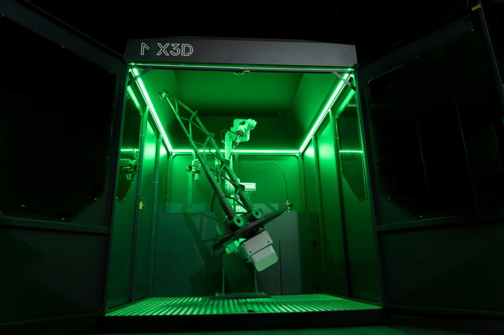 Photo of a metal 3D printer in use.